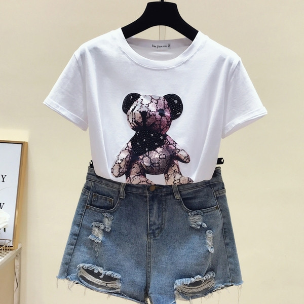 Modern női blúz rövid ujjú fehér színben, rátéttel