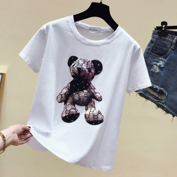 Modern női blúz rövid ujjú fehér színben, rátéttel