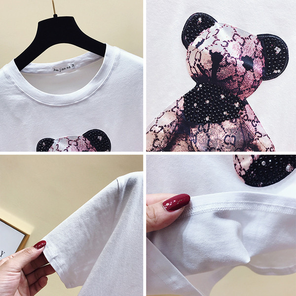 Modern női blúz rövid ujjú fehér színben, rátéttel