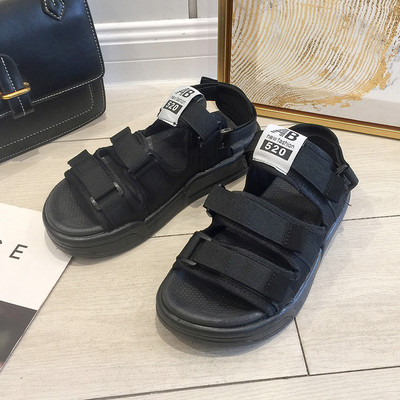 Alkalmi női szandál fekete színben, lapos talppal