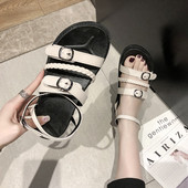 Eko bőrből készült alkalmi női szandál fehér és fekete színben