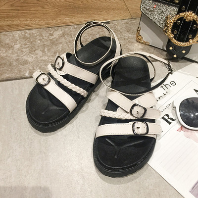 Eko bőrből készült alkalmi női szandál fehér és fekete színben