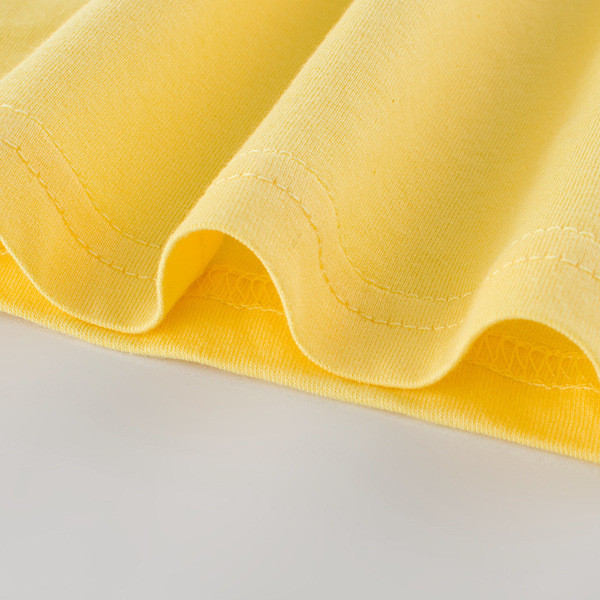 Sárga színű, rátéttel ellátott gyerekcipő fiúknak