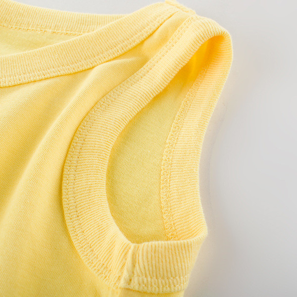 Sárga színű, rátéttel ellátott gyerekcipő fiúknak