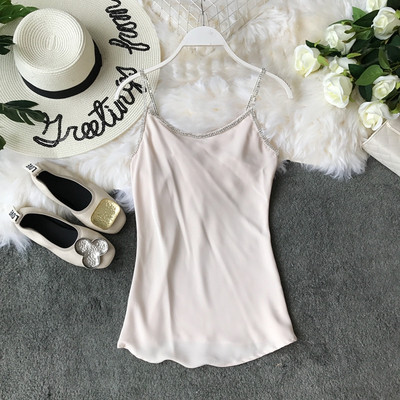 Elegáns, kövekkel díszített női felső négy színben