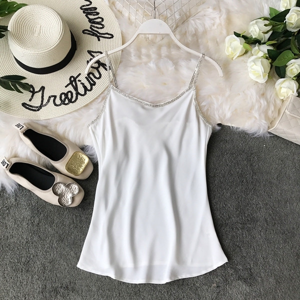 Elegáns, kövekkel díszített női felső négy színben