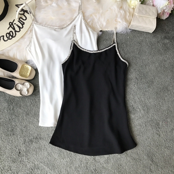 Elegáns, kövekkel díszített női felső négy színben