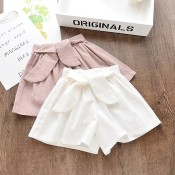 Модерни детски панталони в бял и розов цвят
