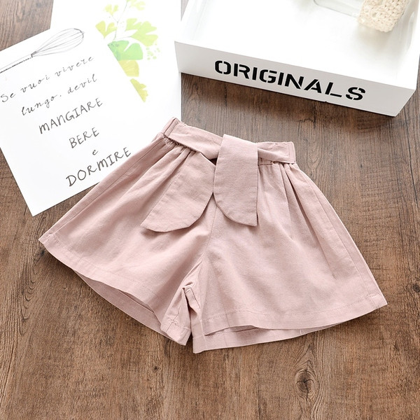 Modern gyereknadrág fehér és rózsaszín színben