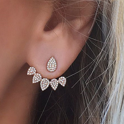 Stylish women`s earrings in silver and gold color