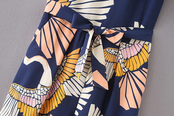 Stílusos női overál virágmotívummal, két színben