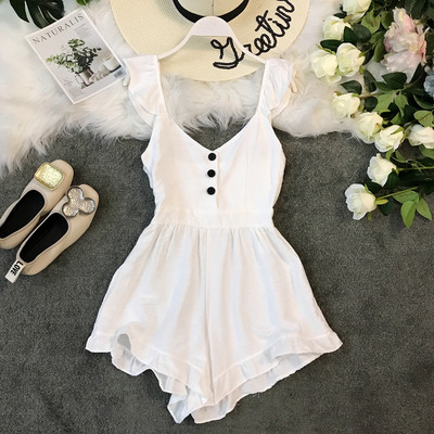 Salopetă de damă modernă cu elemente cu nasturi în alb și negru