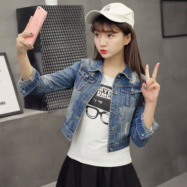 Női farmerdzseki, kék színben szakadt motívumokkal