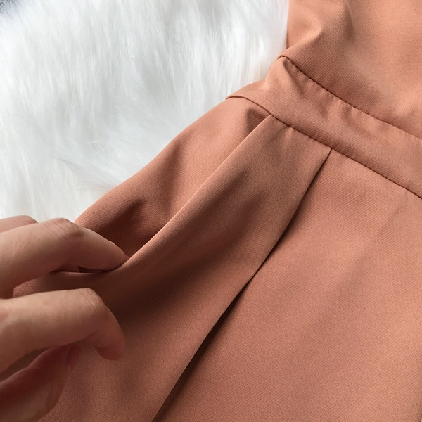 Stílusos női overall 3/4-es ujjal és V-nyakkal