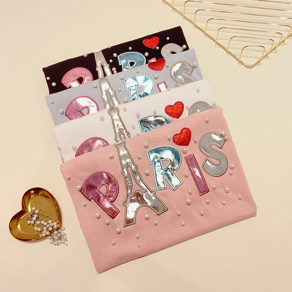 Modern női póló felirattal és gyöngyökkel több színben