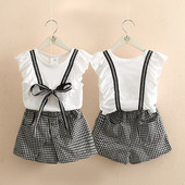 Modern, kétrészes blúzból és nadrágból álló gyerekszett lányoknak