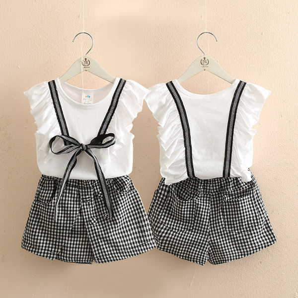 Modern, kétrészes blúzból és nadrágból álló gyerekszett lányoknak