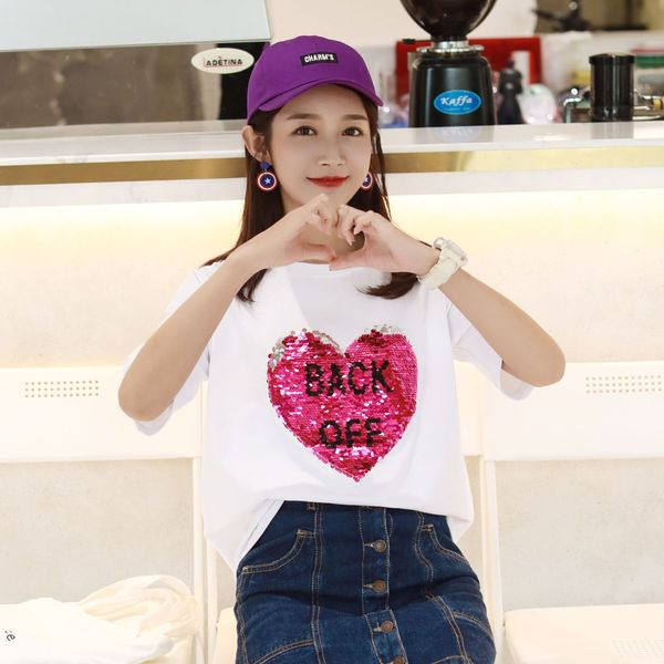 Modern női blúz fehér színben, flitterekkel és rövid ujjal