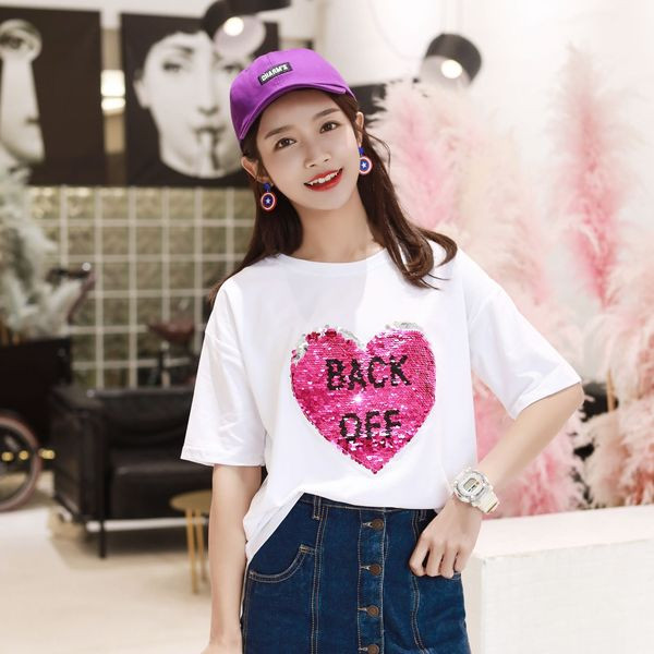 Modern női blúz fehér színben, flitterekkel és rövid ujjal