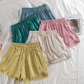 Alkalmi női rövidnadrág nyakkendővel több színben