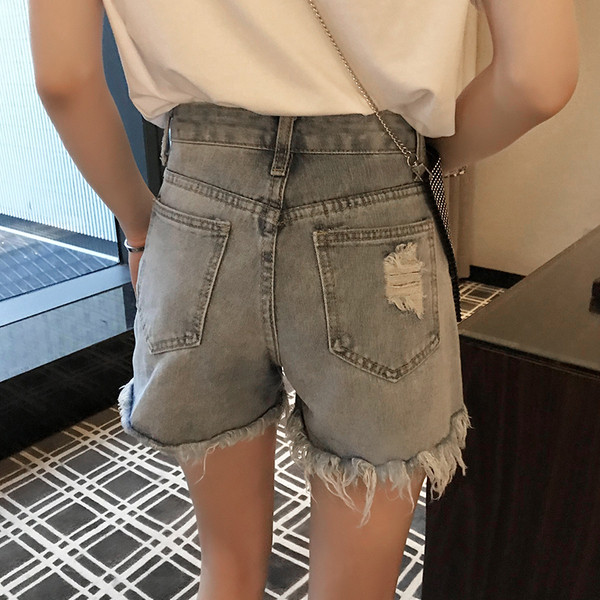 Modern női rövid farmer, kék flitterekkel