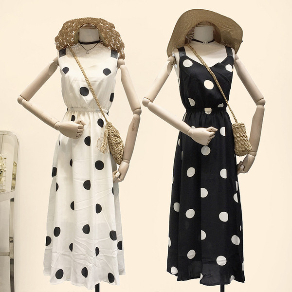 Lezser női pöttyös ruha fehér és fekete színben