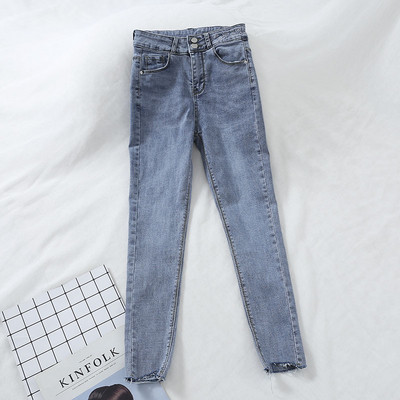 Stílusos női farmer, kék felirattal