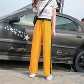 Alkalmi női nadrág zöld és sárga színben