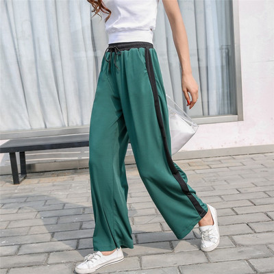 Alkalmi női nadrág zöld és sárga színben