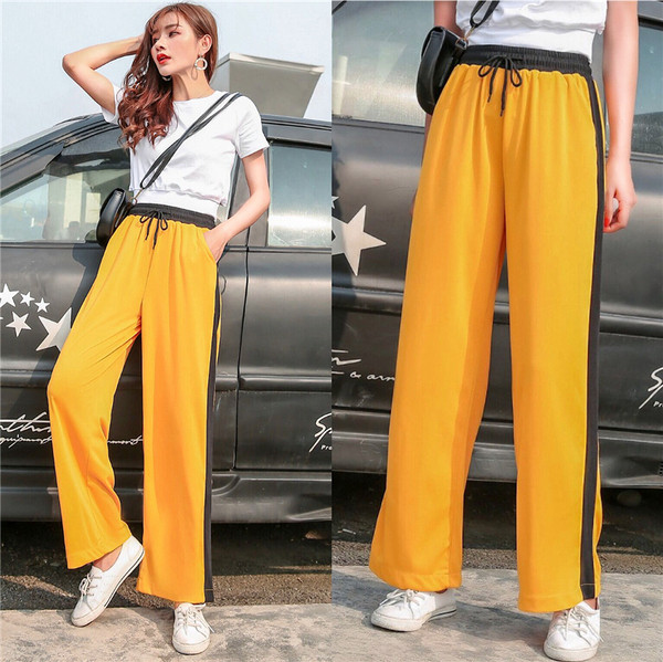 Alkalmi női nadrág zöld és sárga színben