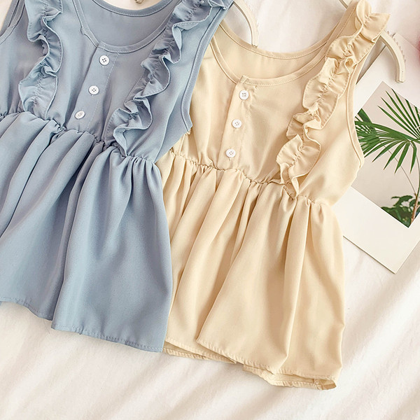 Maieu de damă cu elemente cu nasturi în mai multe culori