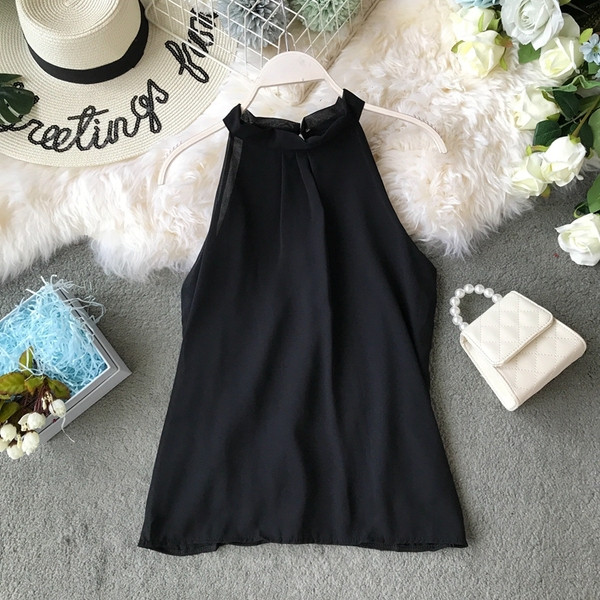 Modern női felső négy színben virágmintával