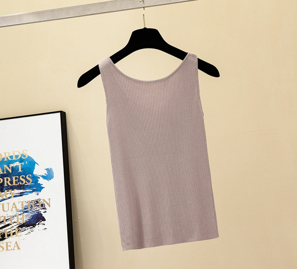 Stílusos női felső, széles pántokkal és nyakkendőkkel, többféle színben