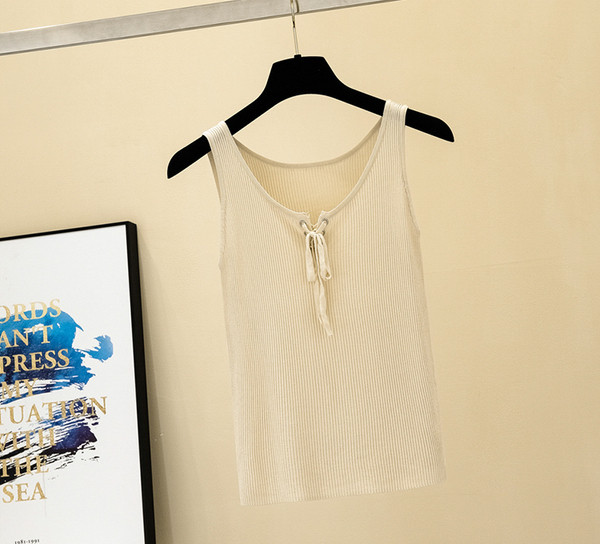 Stílusos női felső, széles pántokkal és nyakkendőkkel, többféle színben