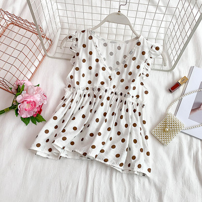 Modern női akasztófelső V-nyakkal, több színben pöttyökben