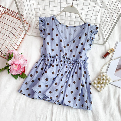 Modern női akasztófelső V-nyakkal, több színben pöttyökben