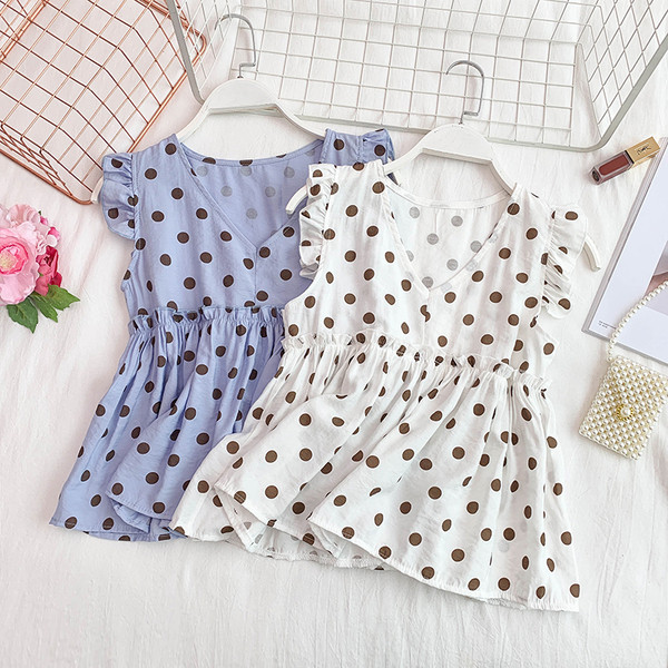 Modern női akasztófelső V-nyakkal, több színben pöttyökben