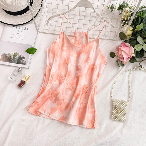 Modern női felső vékony pántokkal és virágmintával