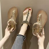 Μοντέρνα γυναικεία σανδάλια με πέτρες σε μαύρο και χρυσό χρώμα