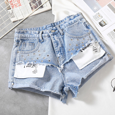 Modern női rövidnadrág szakadt elemekkel