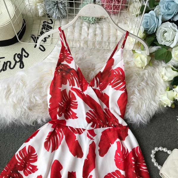 Modern női overál csupasz háttal, vékony pántokkal