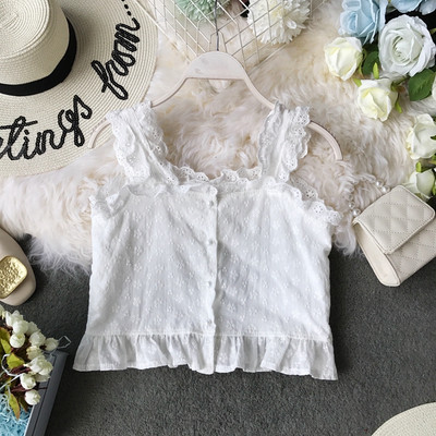 Modern női felső, széles pántokkal és gombokkal