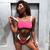 Jelenlegi kétrészes fürdőruha rózsaszín és zöld színben