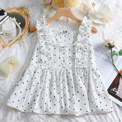 Modern női felső, négy színű pöttyök gombokkal