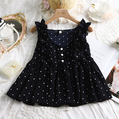 Modern női felső, négy színű pöttyök gombokkal