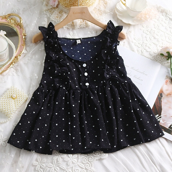 Modern női felső, négy színű pöttyök gombokkal