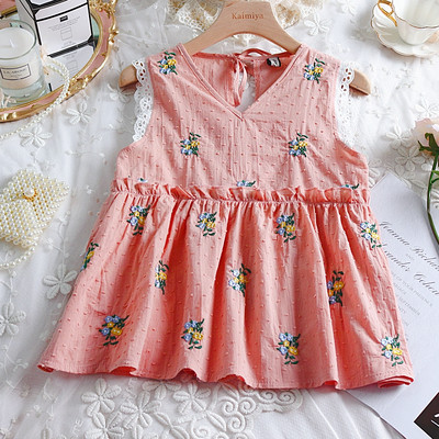 Bluză de damă modernă cu broderie și decolteu în V