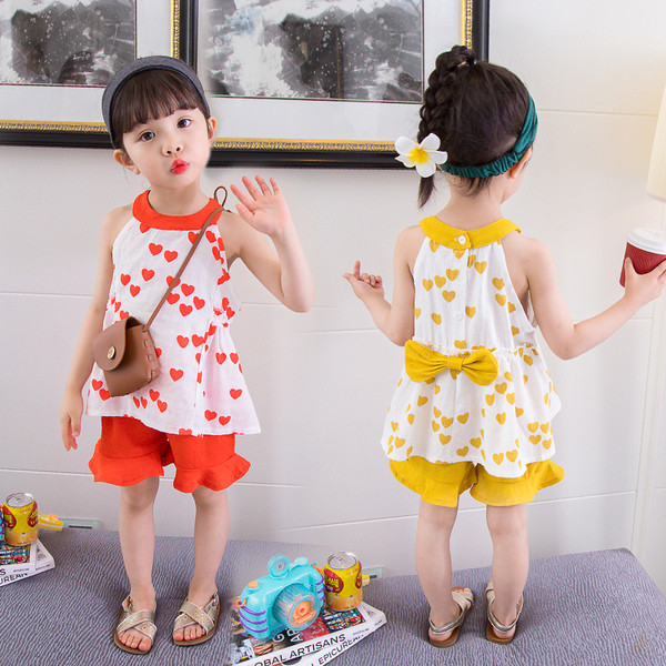 Kétrészes gyerekkészlet sárga és narancssárga szalaggal