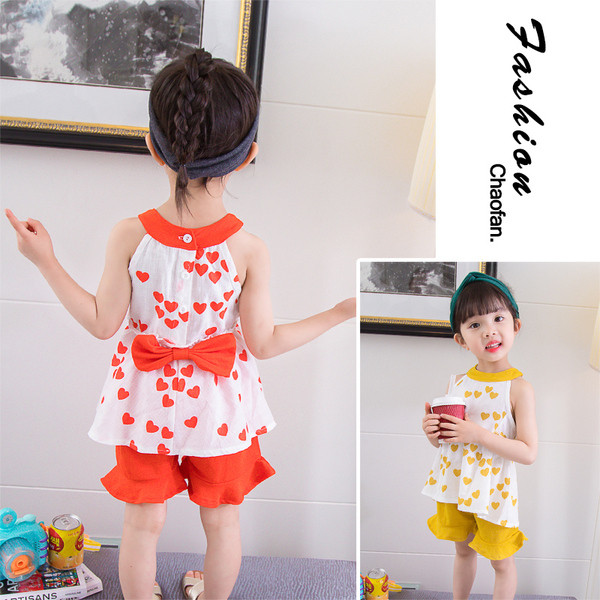 Kétrészes gyerekkészlet sárga és narancssárga szalaggal