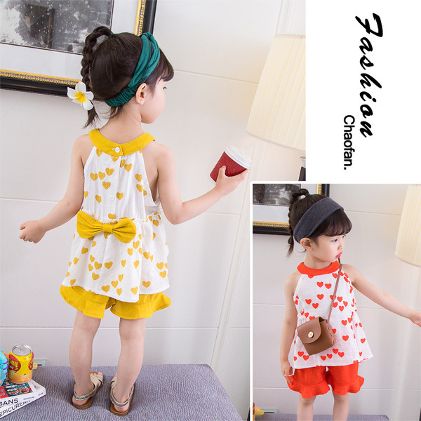 Kétrészes gyerekkészlet sárga és narancssárga szalaggal